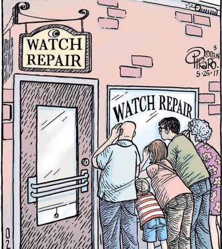 People crowd outside a watch repair shop waiting for service.
