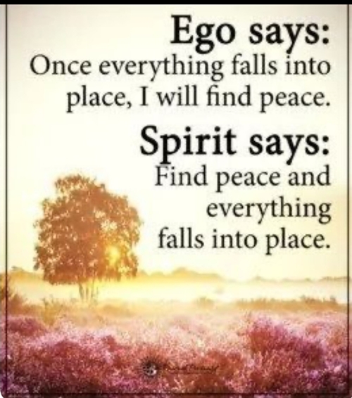 Inspirational quote contrasting ego and spirit with a serene nature background.