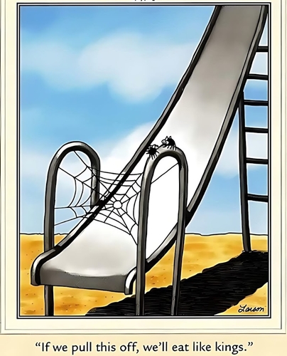 Two people sitting on a slide, ready to slide down together.